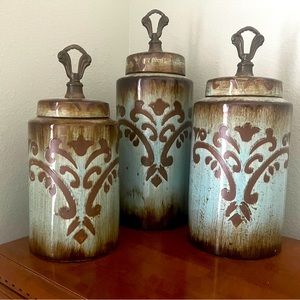 One flower mirror and a set of decorative canisters